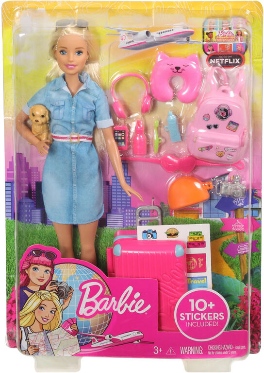 Barbie et ses accessoires de voyage